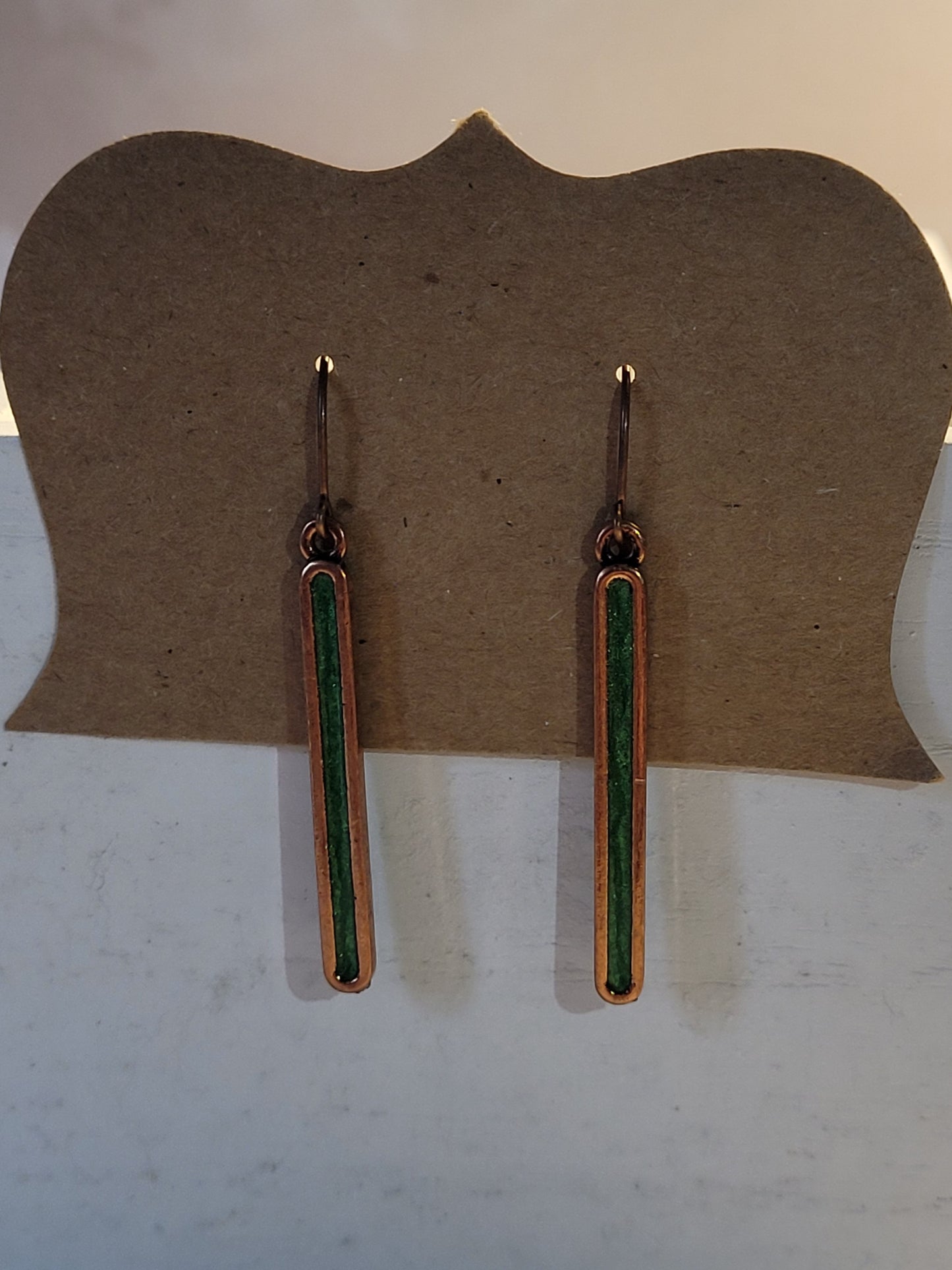 GREEN AND COPPER EARRINGS.