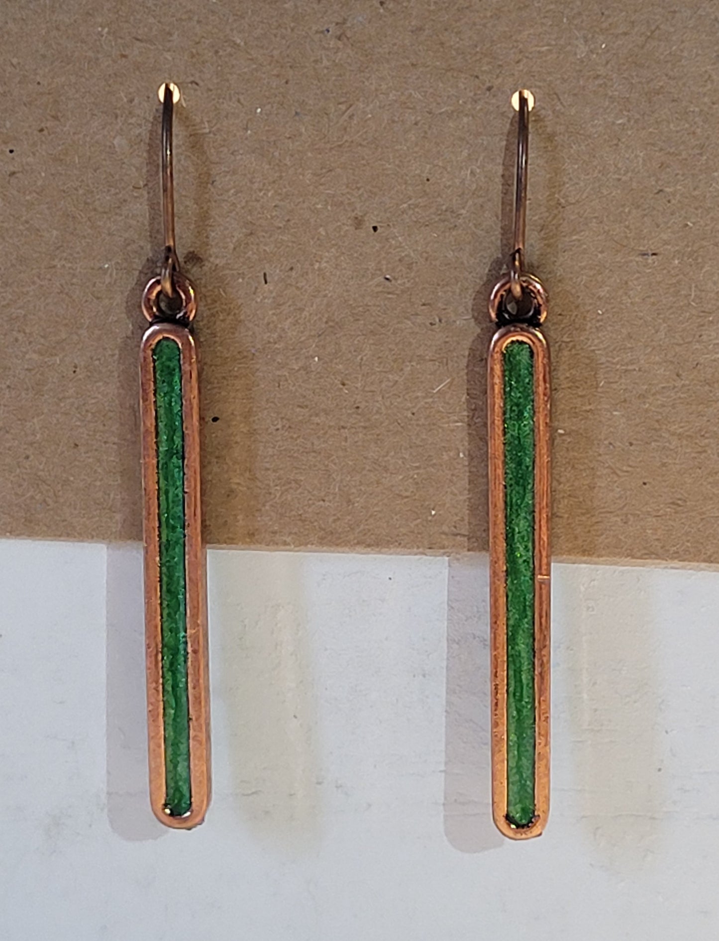 GREEN AND COPPER EARRINGS.